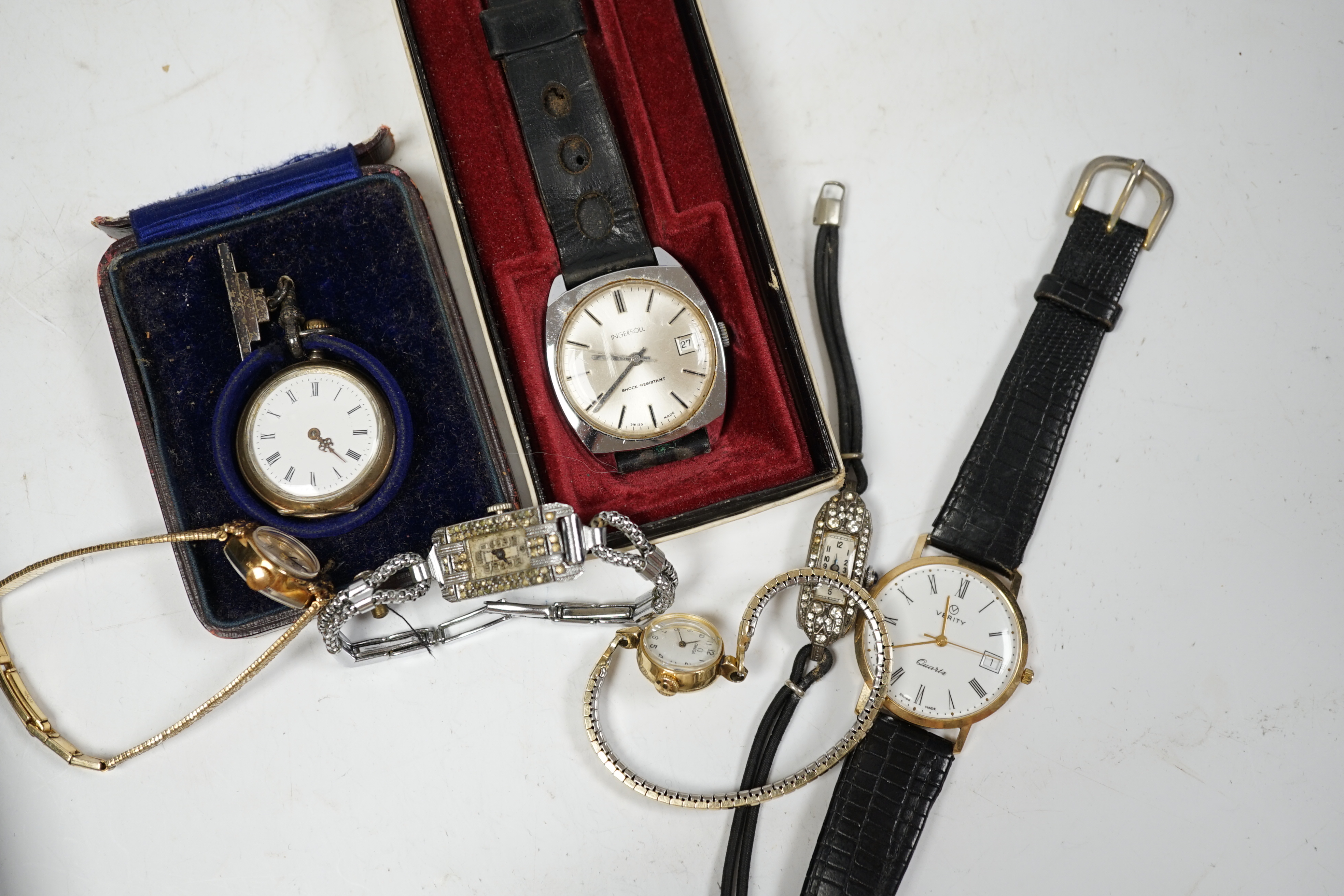 A small group of assorted wrist watches, a Rolex watch movement and a silver pocket watch with other items